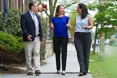 business and commercial lending team walking outside