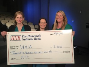 HNB donation to WVIA, three women holding large check