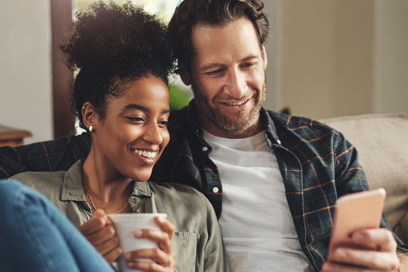 couple sitting at home discussing finance