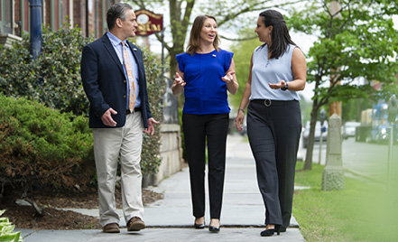 business and commercial lending team walking outside