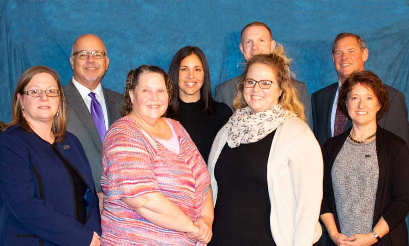 Seven people getting honored for their five year mark.